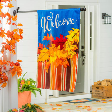 The Cascading Leaves house banner features bright fall leaves with coordinating stripes and the word "Welcome" across a vivid blue top.