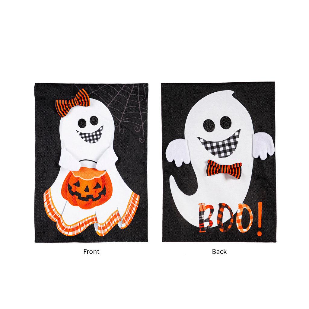 The Girl and Boy Ghost Reversible garden flag features a grinning girl ghost holding a pumpkin basket on the front, and a grinning boy ghost with the word "BOO!" on the back. 