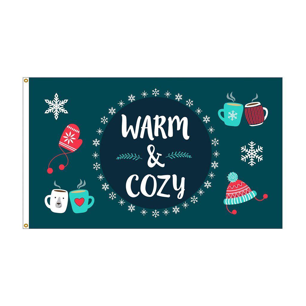 Our 3' x 5' Warm & Cozy Winter flag features snowflakes, a hat, mittens, and warm drinks along with the words "Warm & Cozy" on a navy and dark teal background.