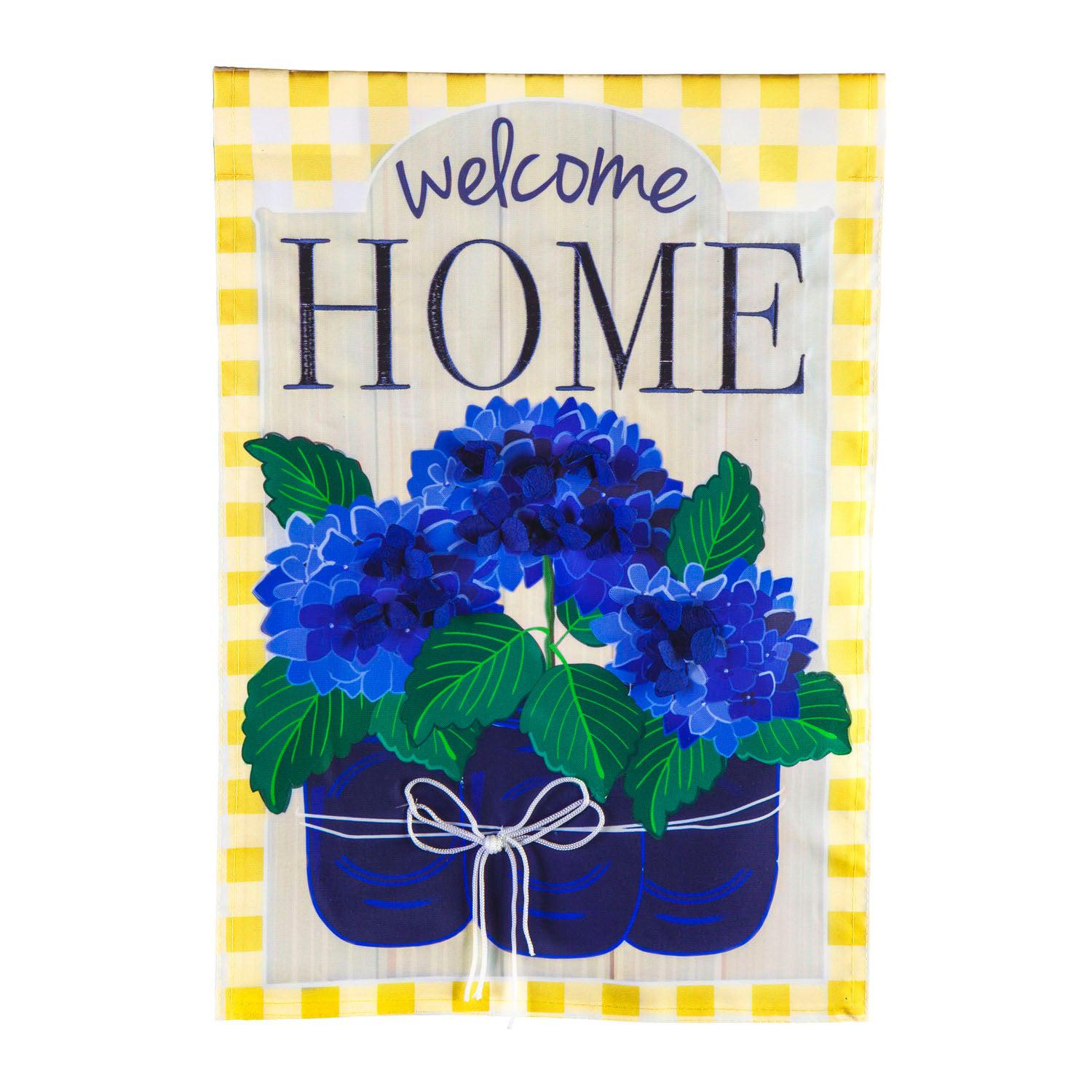 The Welcome Home Hydrangeas garden flag features vivid royal blue potted hydrangeas, a yellow checked border, and the words "Welcome Home" across the top of the flag.